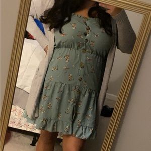 Sage green dress, the dress is too short for my liking
